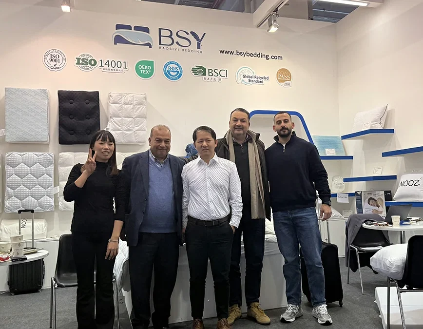 Baosiyi management team group photo with overseas partners at global textile fair